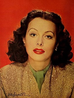 Signed idol portrait of Hedy Lamarr with red background